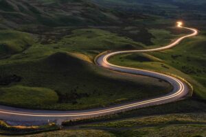 Bright road through a valley